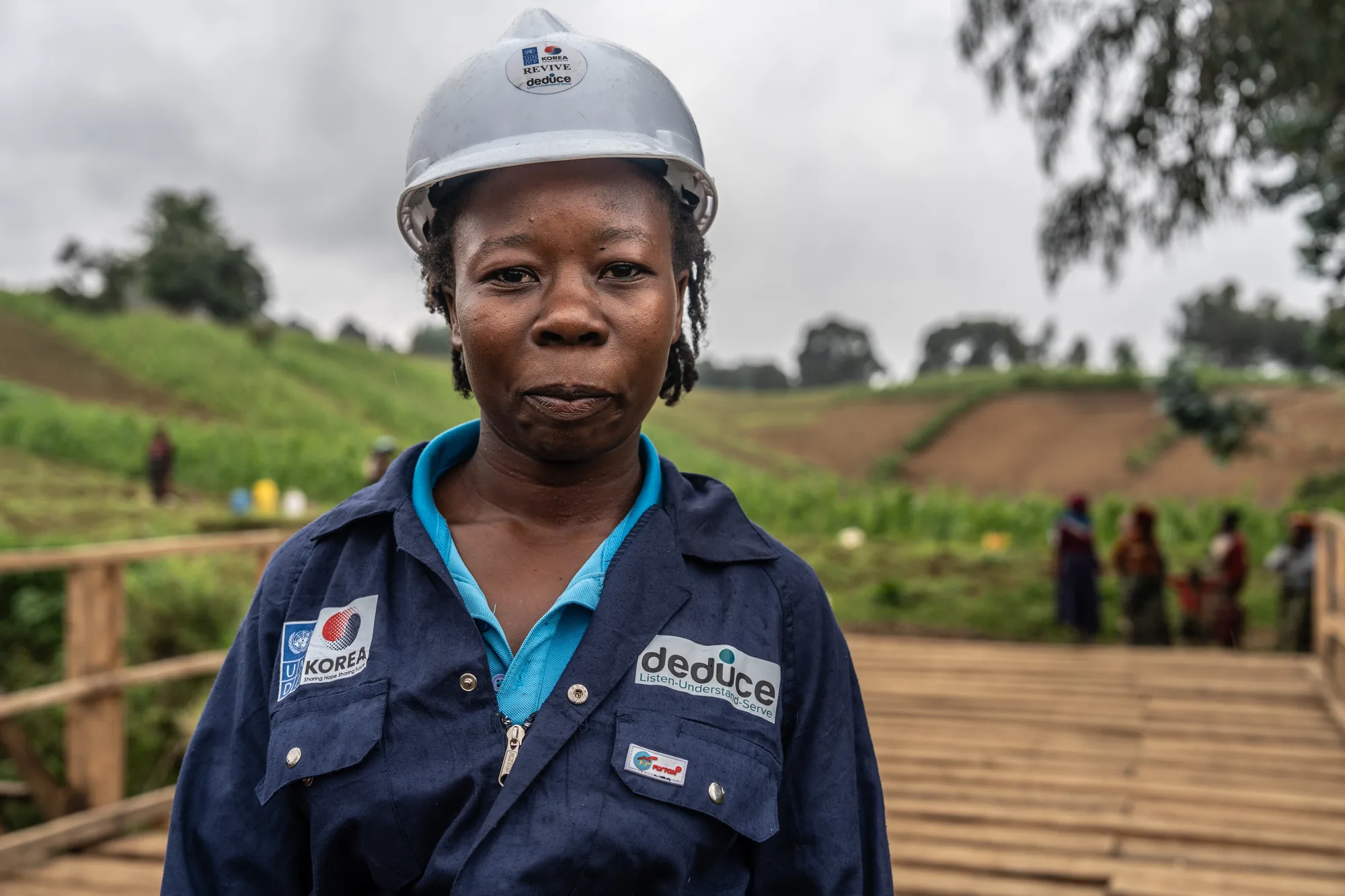 Cibalonza Matabaro Esther helped build the Rusisiro Bridge in eastern Democratic Republic of the Congo through a R.E.V.I.V.E.-supported cash-for-work initiative. The bridge reconnects communities, while the work itself provided income that helps support her family and send her three children to school.